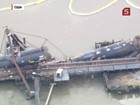В американском штате Нью-Джерси рухнул в реку грузовой поезд с химикатами, произошла утечка ядовитого газа