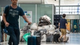 Минтранс предложил не взвешивать дамские сумки и портфели авиапассажиров