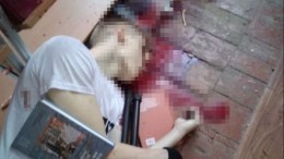 Шокирующие кадры с места, где нашли тело подозреваемого в убийствах в Керчи (18+)