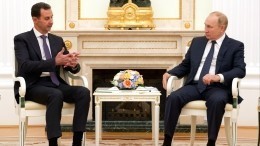 Путин поблагодарил Асада за принципиальную позицию по поддержке действий РФ
