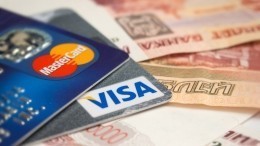 Центробанк: Карты Visa и Mastercard российских банков продолжат работать в РФ
