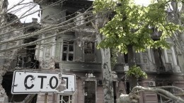 «Люди бегут в крови»: военкор «Известий» снял обстрел Донецка на видео