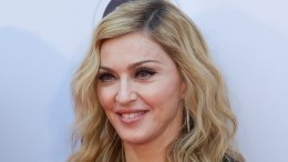 «Красиво срежиссировано»: зачем Мадонна жевала украинский флаг