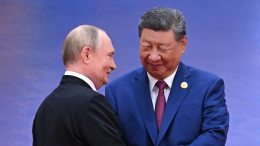 Обсудили США: Ушаков раскрыл детали беседы Путина и Си Цзиньпина на полях ШОС