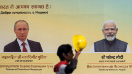 Портреты на улицах: в Нью-Дели ждут прибытия Владимира Путина