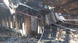 Выгоревшие здания и тела погибших: кадры последствий удара ВСУ по гостинице и кафе в Херсонской области